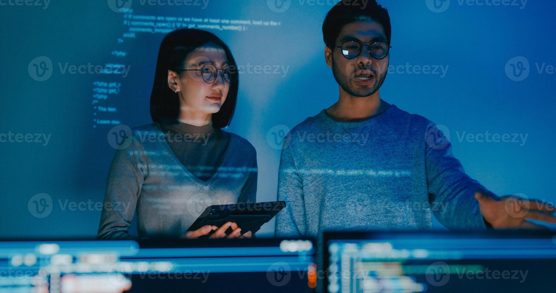 Group adult Asia male female software developers mentor leader manager talk strategy plan to executive write prompt AI bot app program nomad, data center. photo
