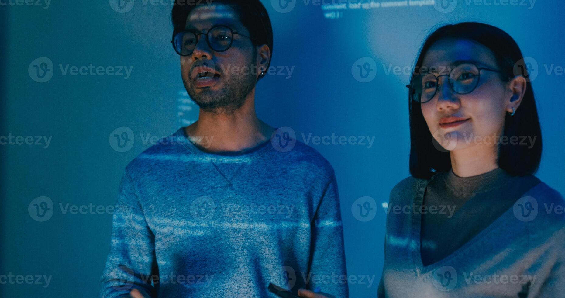 Group adult Asia male female software developers mentor leader manager talk strategy plan to executive write prompt AI bot IT app program nomad, data center. Projecting slideshow code photo