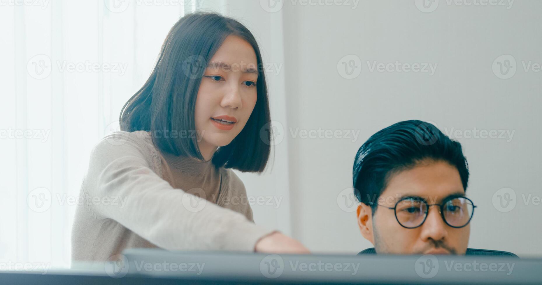 Group Adult Asia male, female freelance meeting write prompt AI bot IT app smart program nomad, game, talk strategy, discuss plan, user interface, designer, big data center on desktop computer. photo