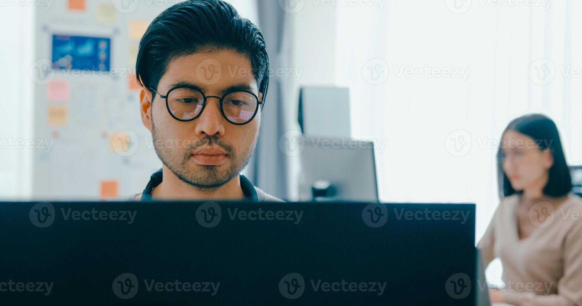 Group Adult Asia male, female freelance typing write prompt AI bot IT app smart program nomad, game, terminal with coding language, user interface, big data center on desktop computer photo