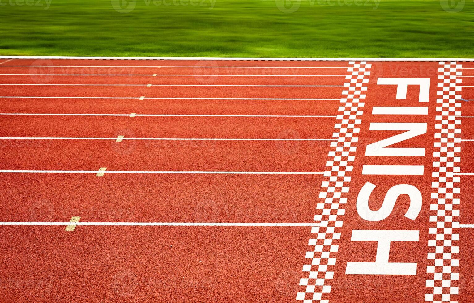 Forward to finish line on red running track. Concept of Business Competition Game, Strategy and Challenges. photo