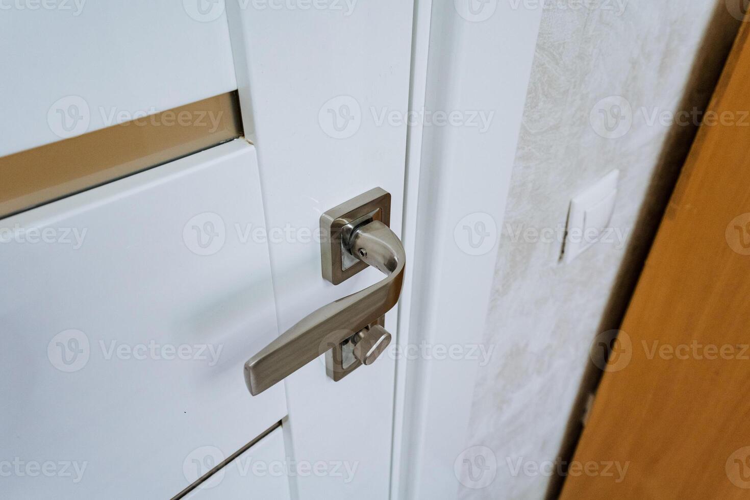 Introducing a stylish modern door handle and lock, perfect for enhancing contemporary interior design elements. Elevate your space with this sophisticated and functional hardware piece photo