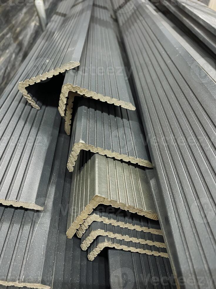 Metal angles, designed for construction, are neatly stacked for easy access and quick retrieval, ensuring efficiency and convenience for various projects and applications photo
