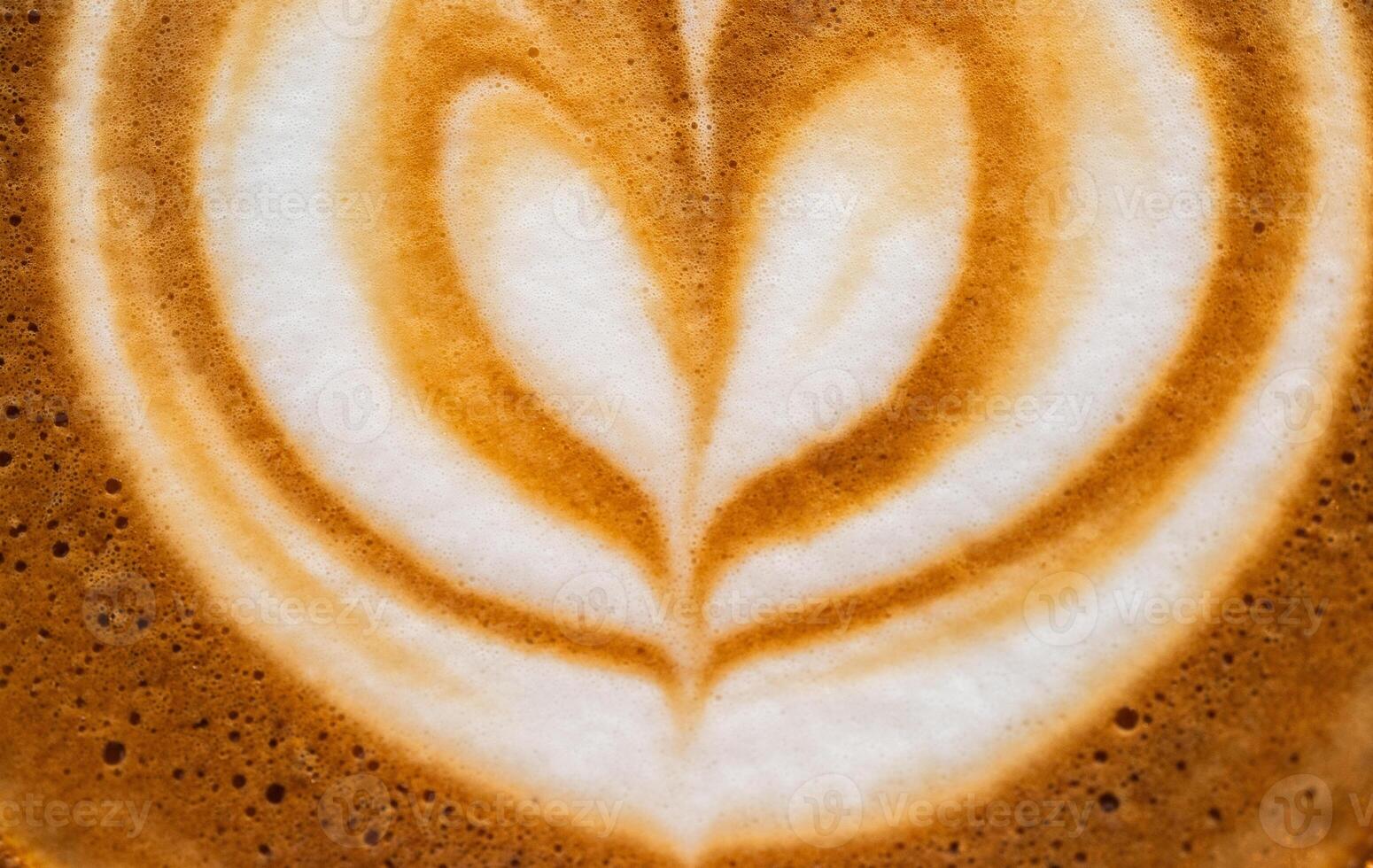 Full frame shot of the surface of hot latte coffee. photo