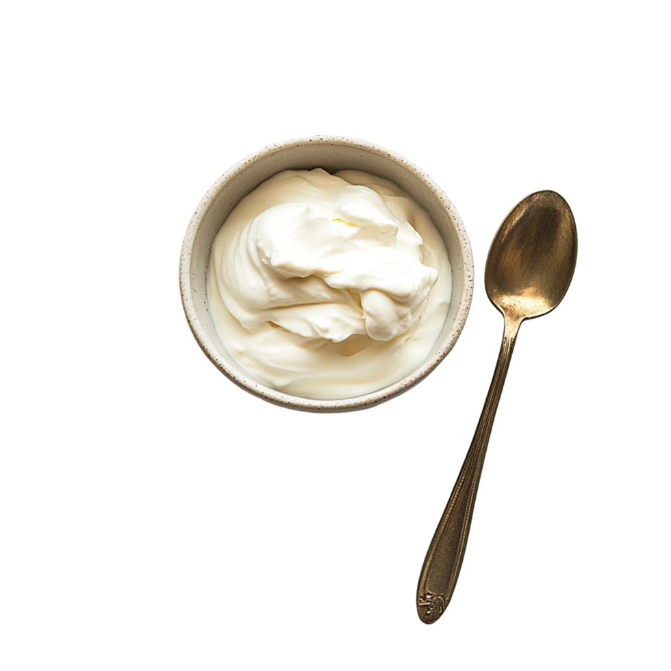 A bowl of creamy sour cream with a spoon resting png