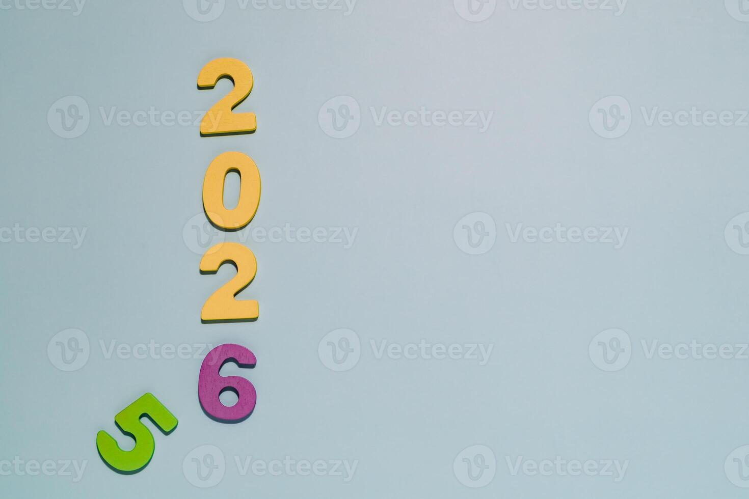 Vibrant 2026 Numbers on Pastel Blue, New Year and Future Concepts photo