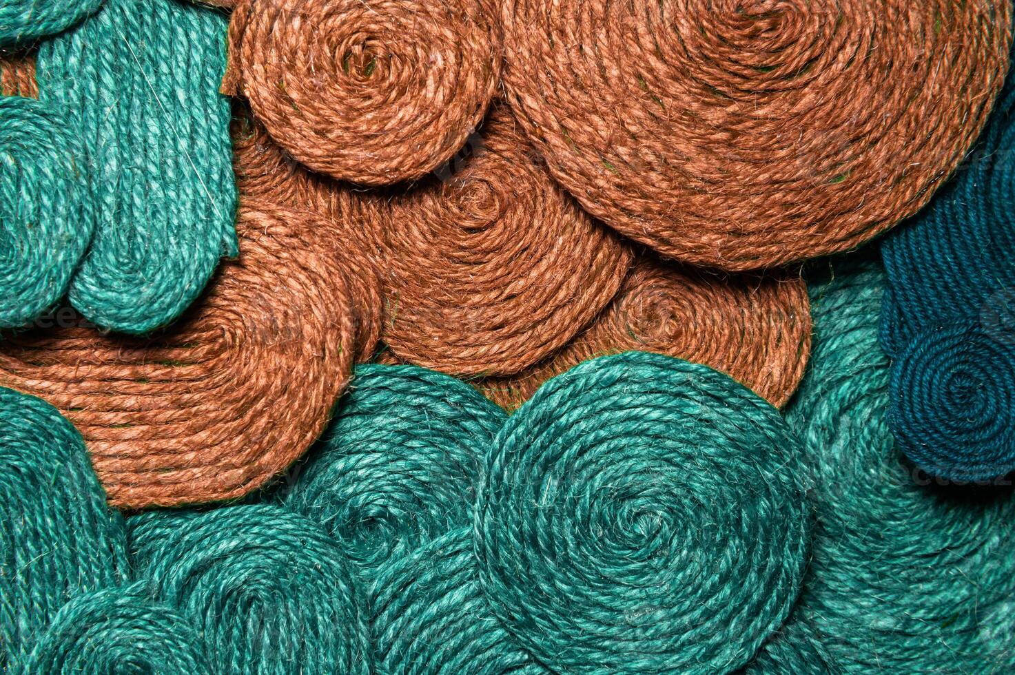 Background of different colors of textures of threads connected together. Abstract textile background photo