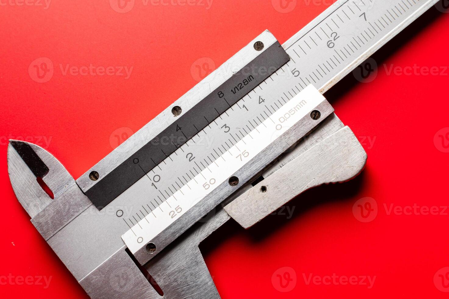 Close-up of a caliper on a bright saturated background. A tool for precise and accurate measurement photo