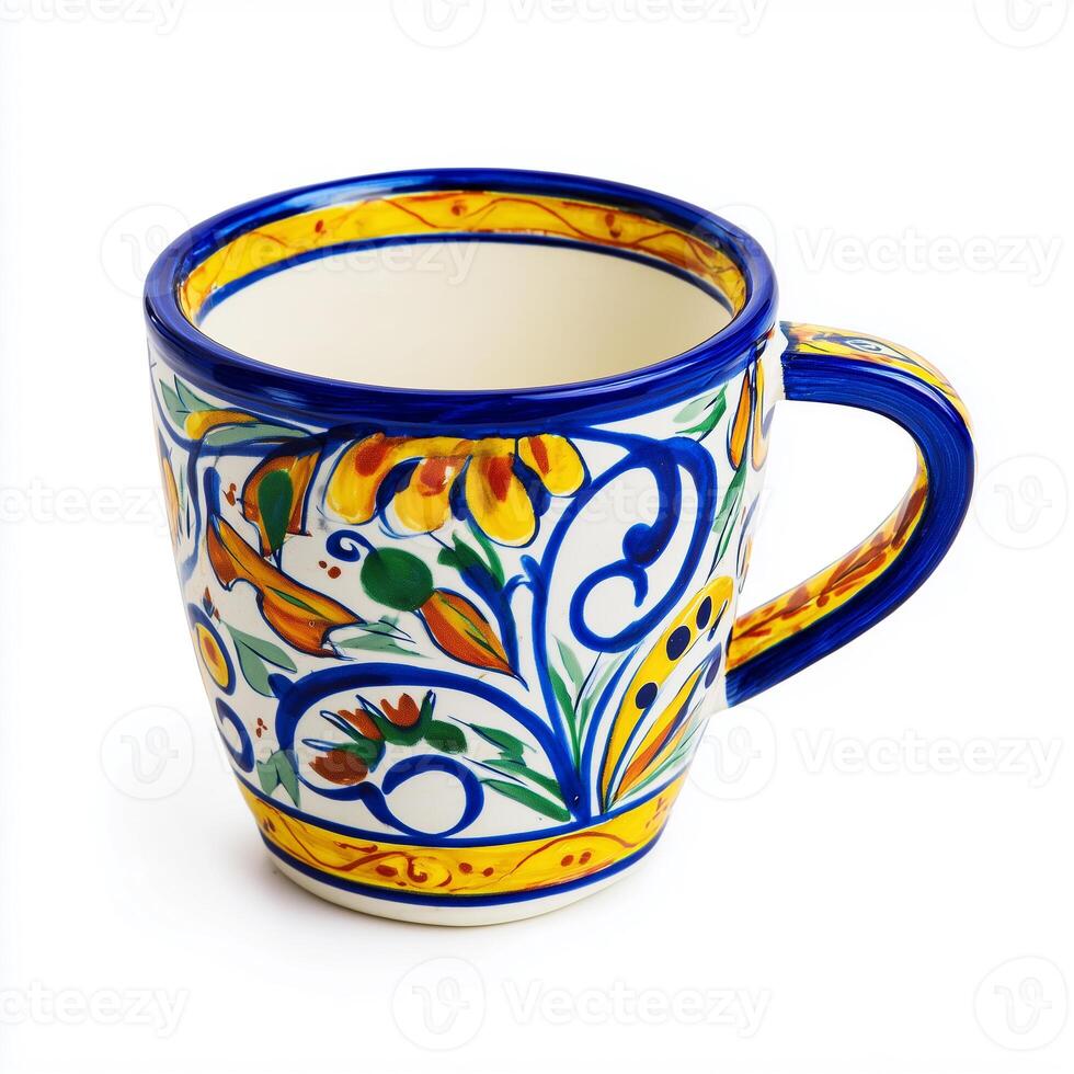 Beautiful Mexican talavera ceramic cup featuring vibrant floral designs on a white background photo