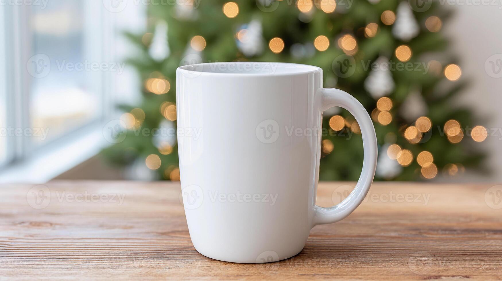 White ceramic mug for mockup placed on a wooden table near a window with soft warm bokeh lights in the background, creating a cozy holiday ambiance photo