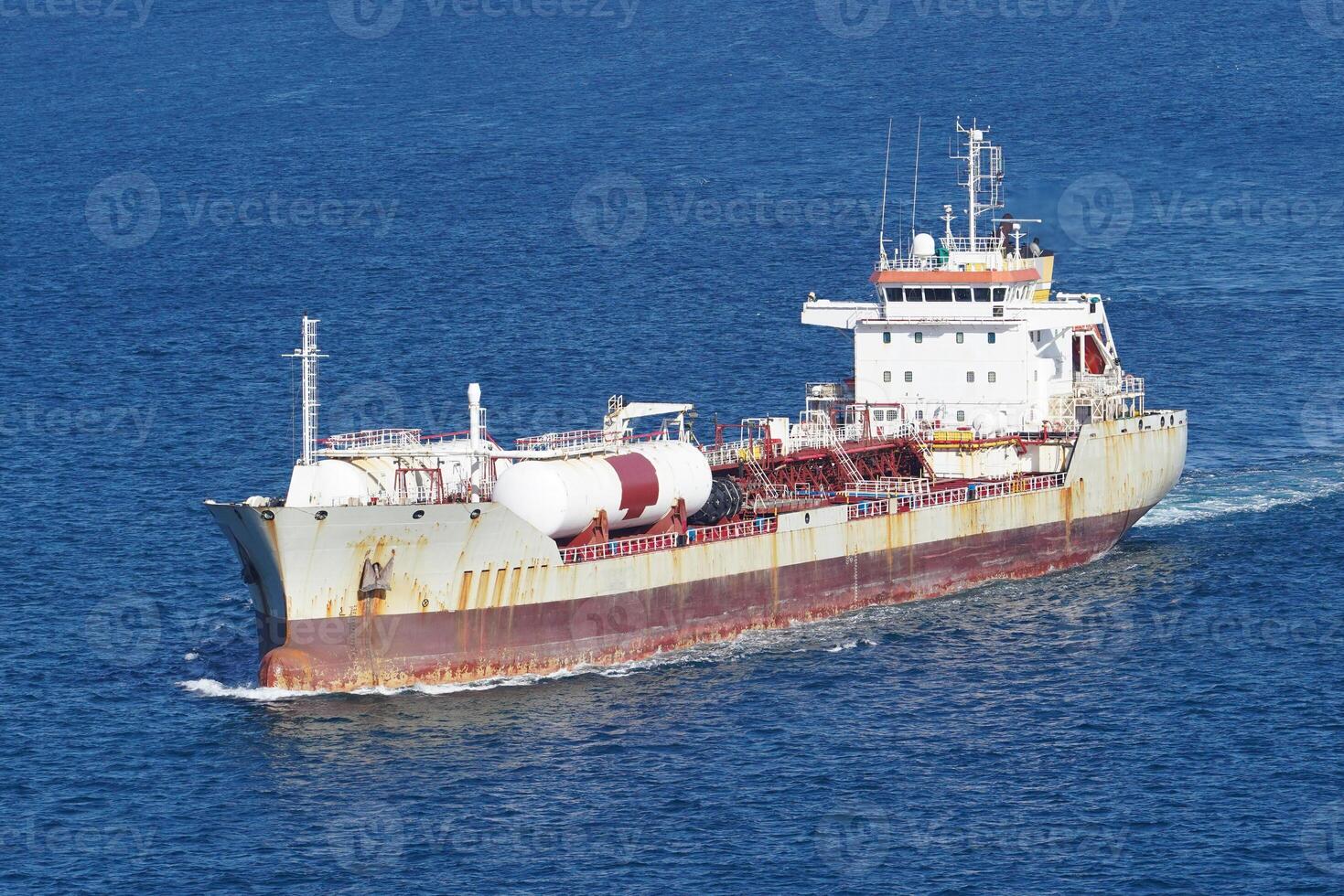 Grey Big Tanker Ship in sea photo