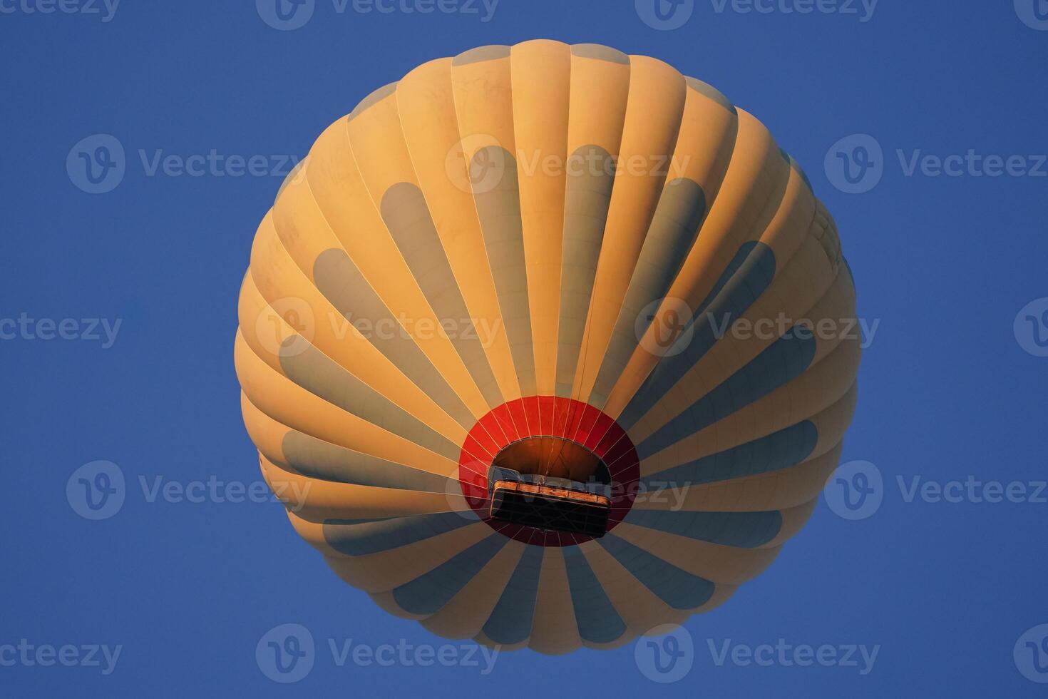 Yellow Hot Air Balloon in Cappadocia in Nevsehir, Turkiye photo