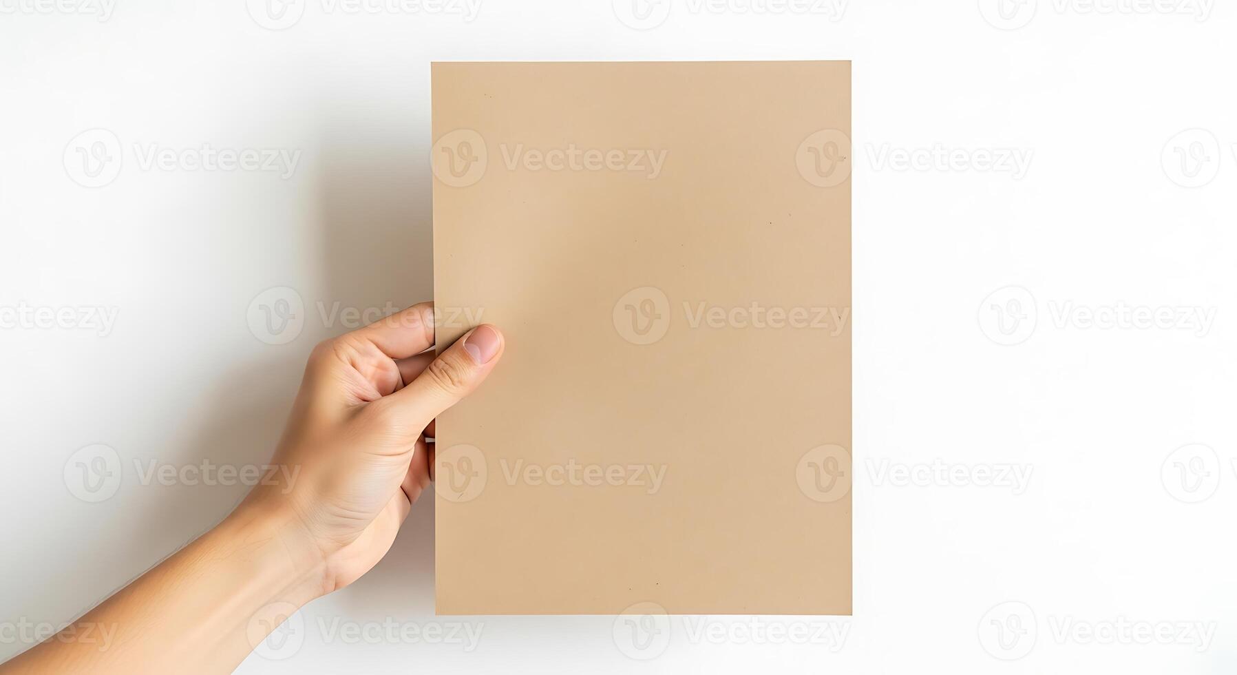 Tan Cardstock Held in Hand photo
