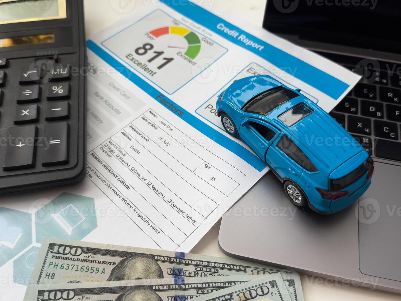 Credit score report and calculator with computer keyboard on the desk. photo