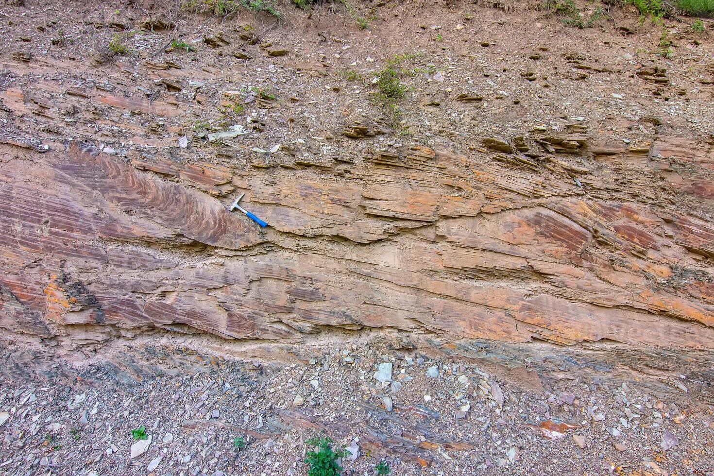 Wide view of the Flysch Sediments with Geological Hammer in Serbia photo