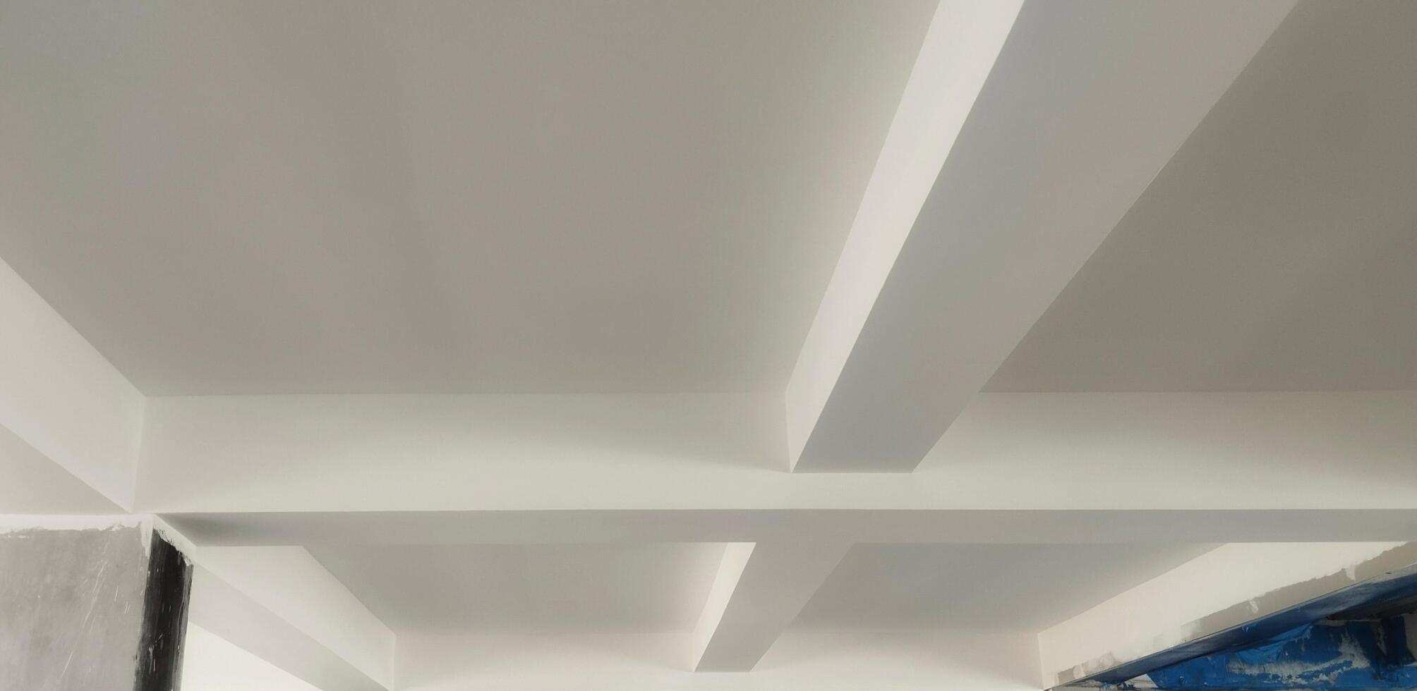 Ceiling and frame in the classroom. White ceiling with geometric shapes photo