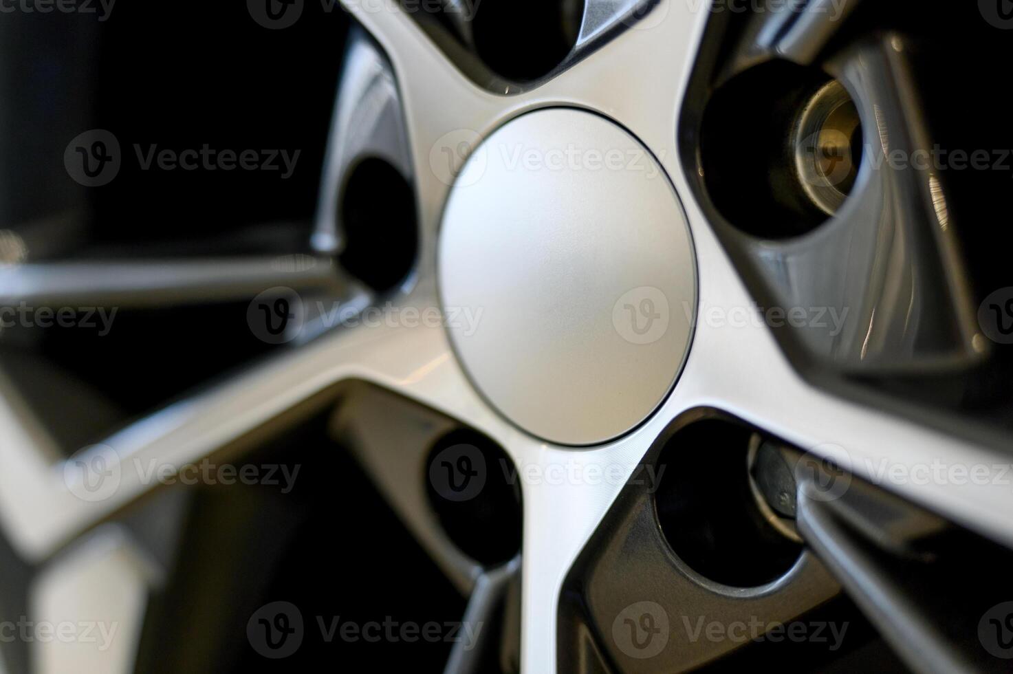 Car wheel with brake calipers and stylish design.Close up photo