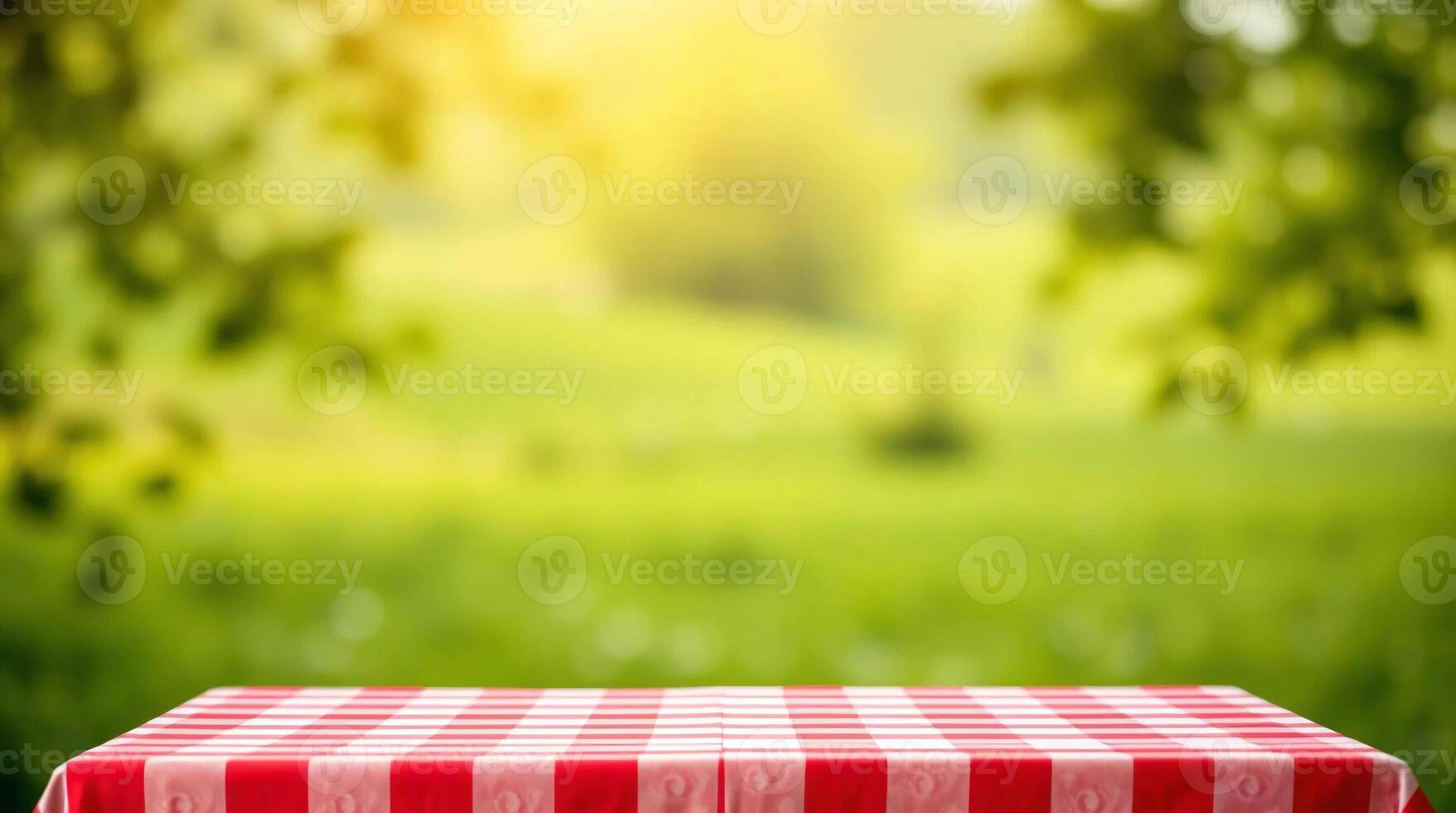 Tablecloth on the green grass with a sunny background photo