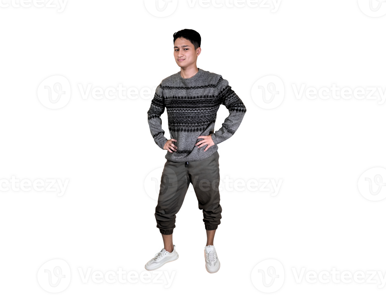 Full-length portrait of a confident young man in a grey patterned sweater standing with arms crossed. png