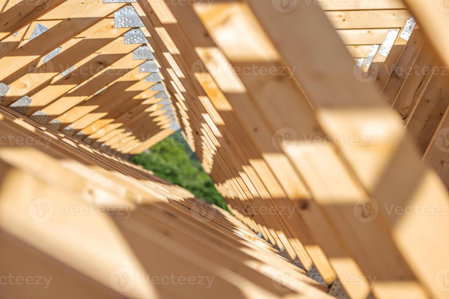 Wooden Structure Showcasing Intricate Design and Natural Light Play in Outdoor Setting photo