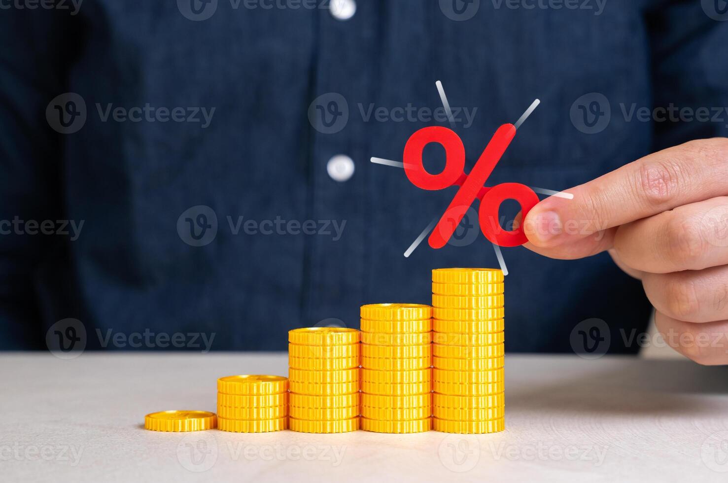 Growing stack of coins and percentage symbol. Capital growth and increase of savings on deposit and investments. Financial planning, return on investment, and interest compounding. photo