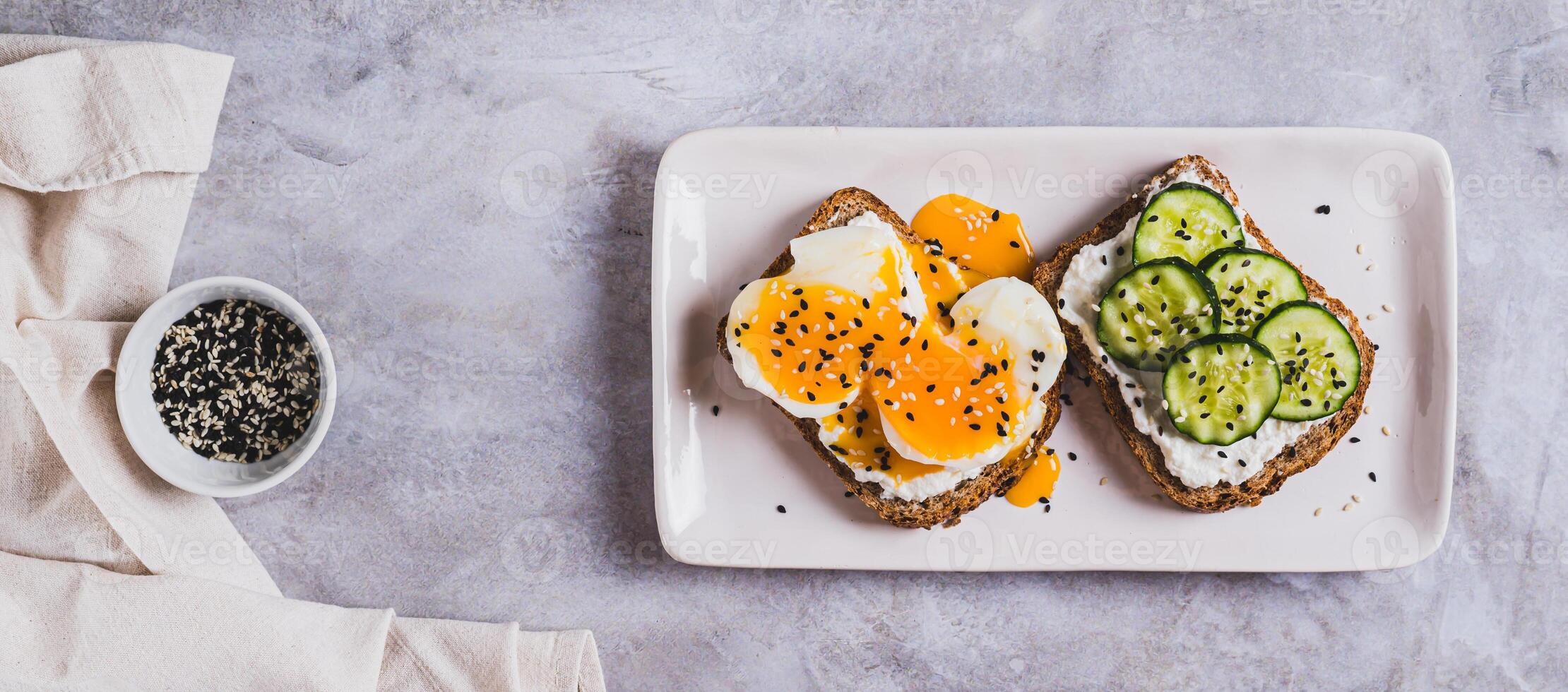 Avocado toast with veggies and eggs photo