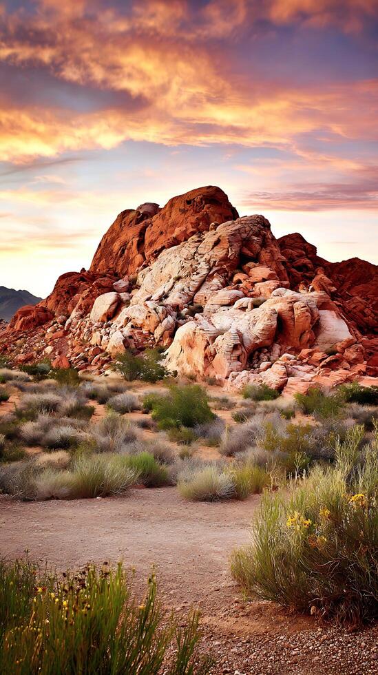 Dramatic Sunset Paints Desert Rocks With Fiery Orange and Purple Hues. photo