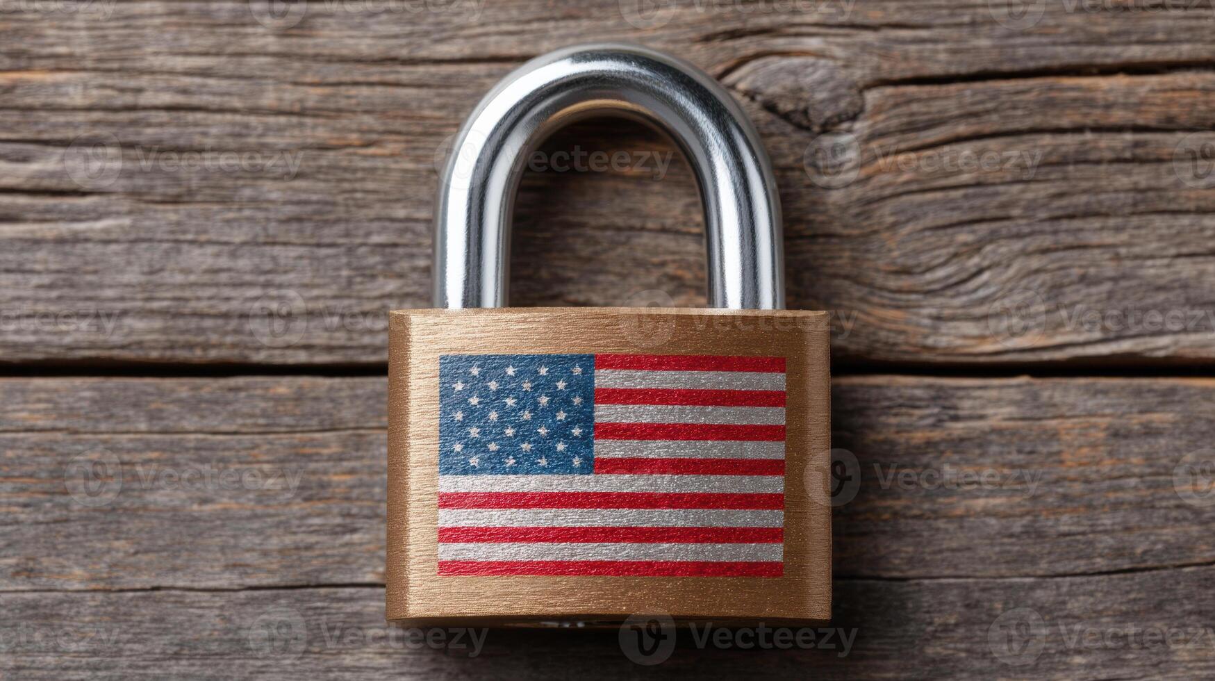 Global market tariff trade war. Brass padlock with American flag design locked on rustic wooden surface, symbolizing security and patriotism photo