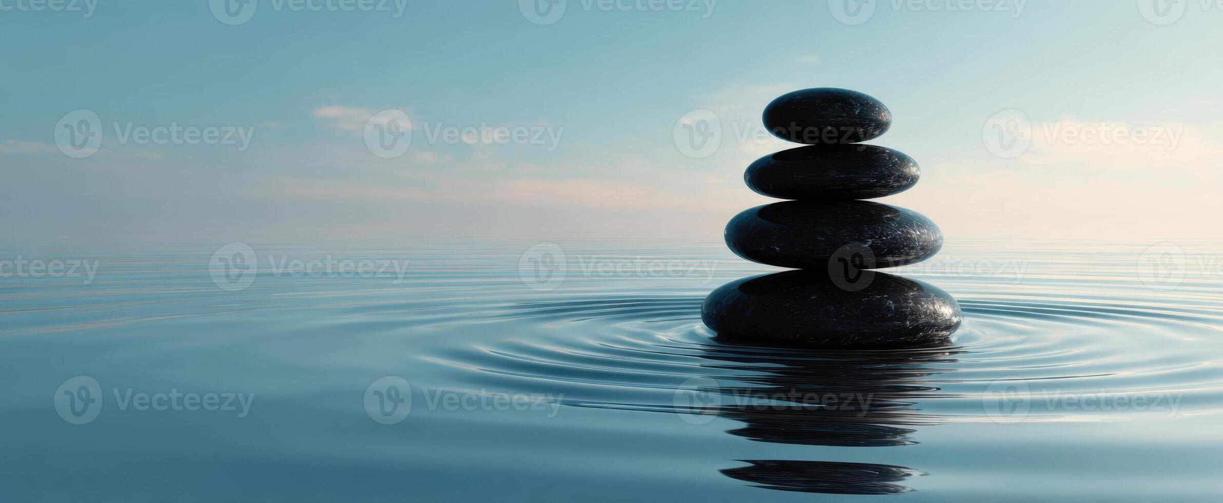 The Tranquil Stack of Stones Balancing on Water Surface photo