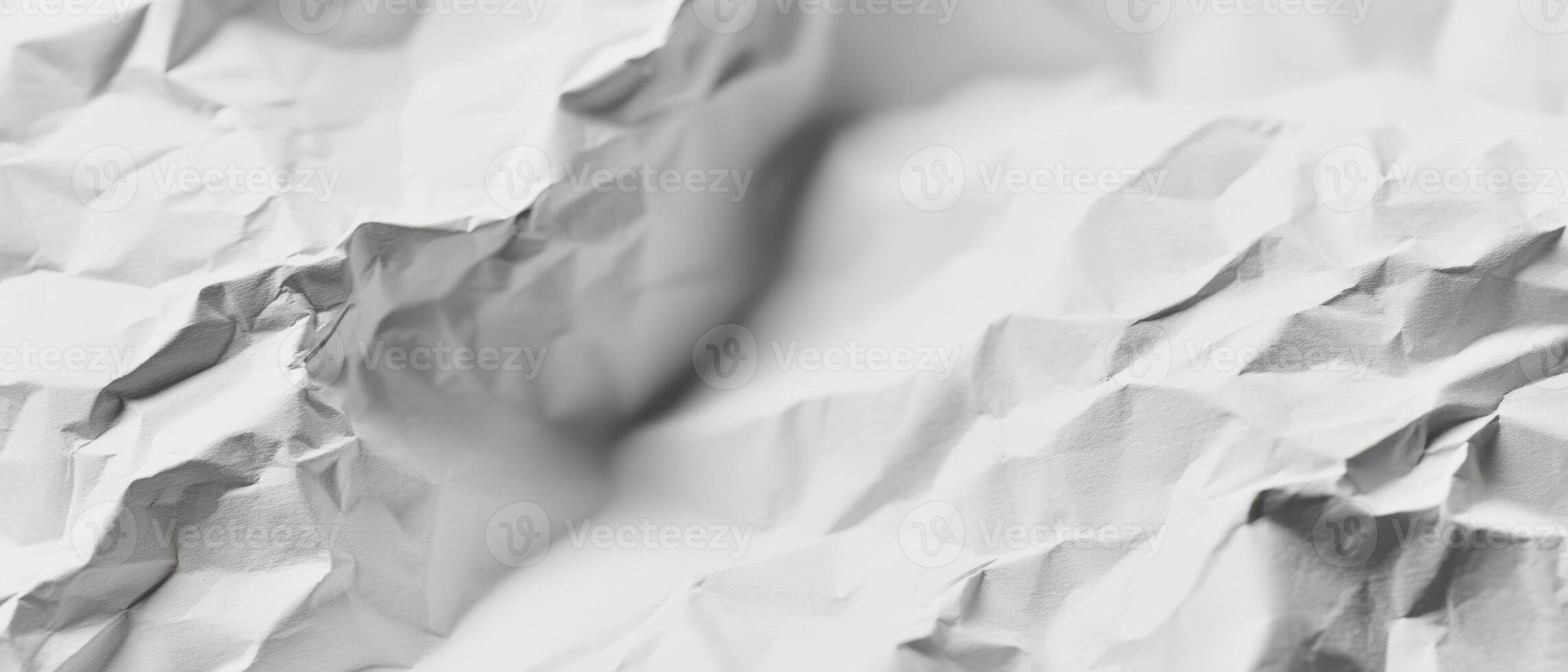 The elegant texture of crumpled white paper showcasing intricate details and patterns. photo