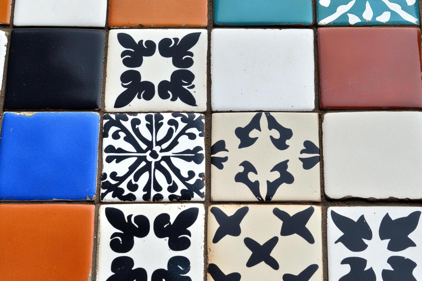 A variety of colorful tiles arranged in a pattern photo