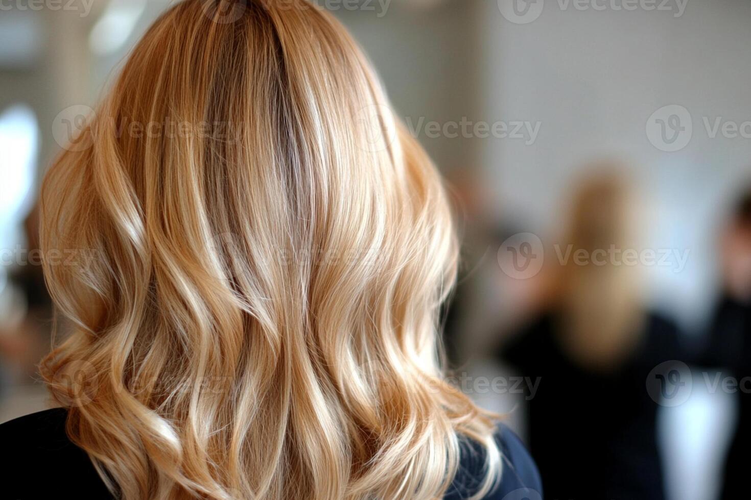 A woman with long blonde hair in a salon photo