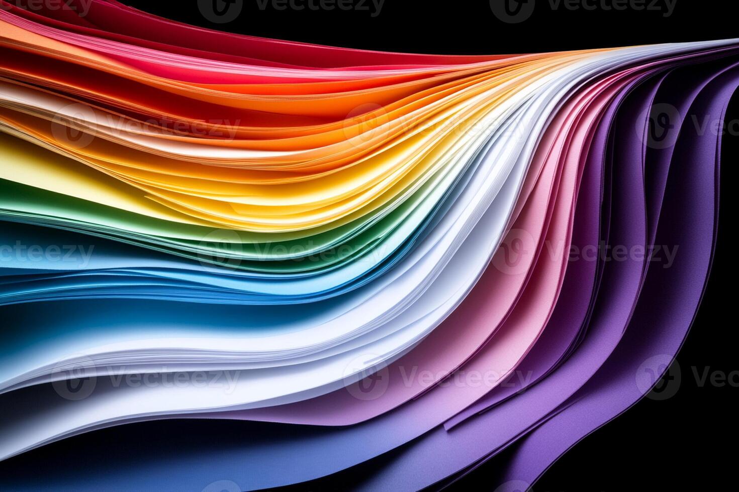 A rainbow colored paper with many folds photo