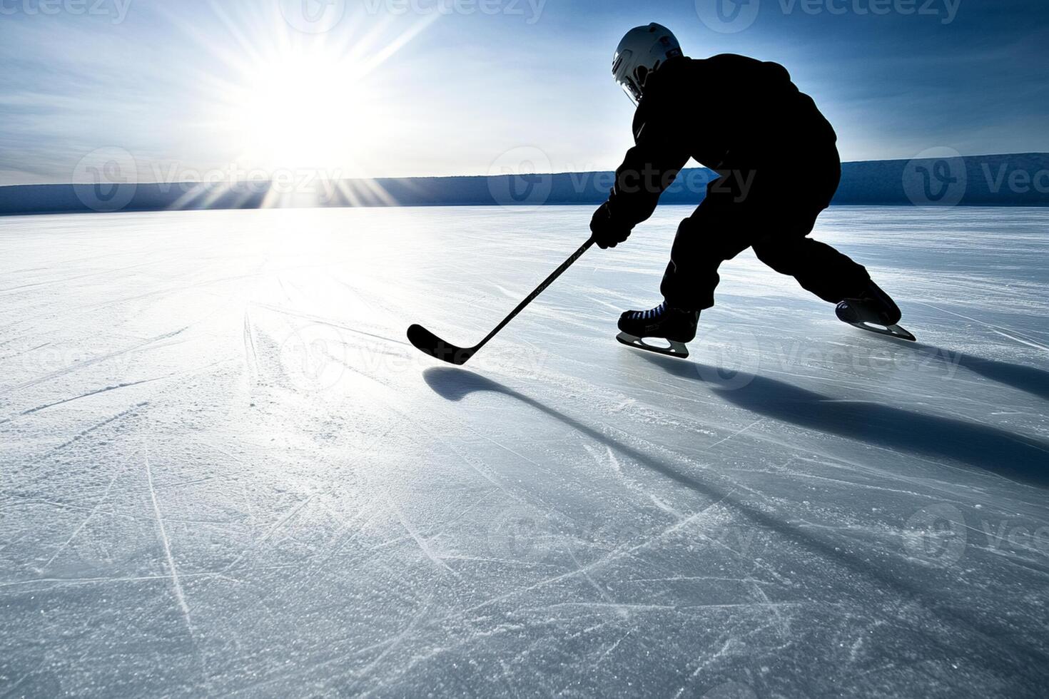 A person is skating on an ice rink photo
