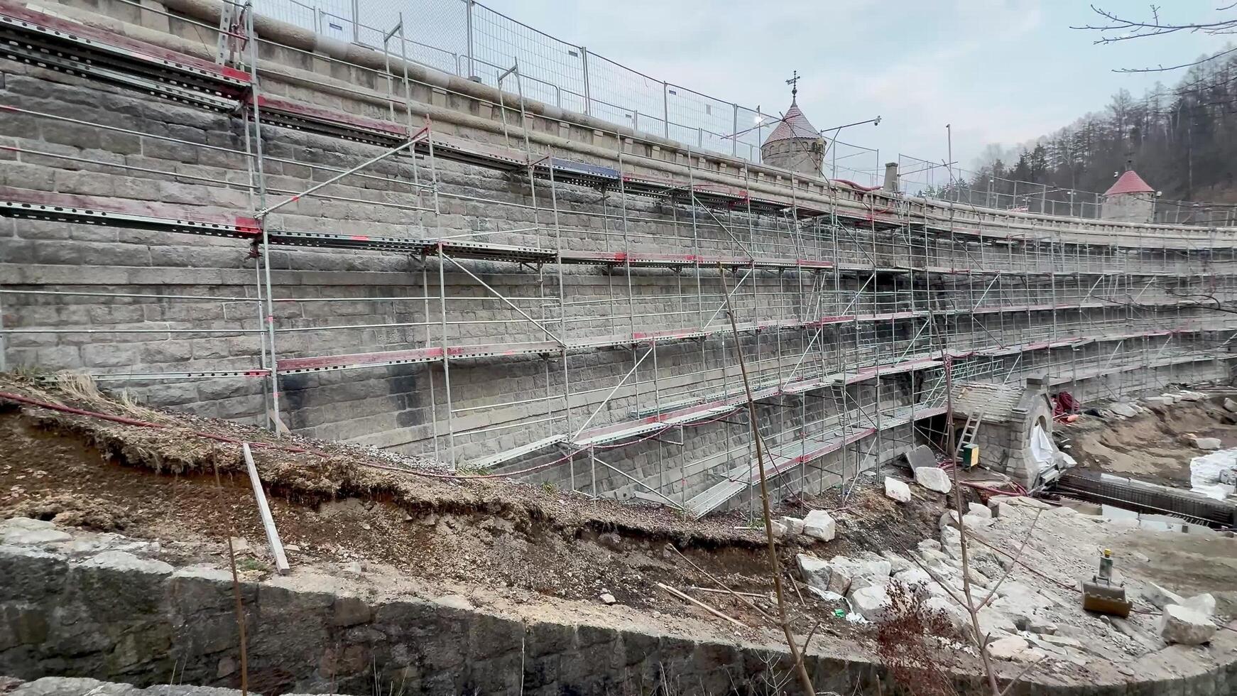 A Construction Site featuring Scaffolding along with expertly designed Retaining Walls photo