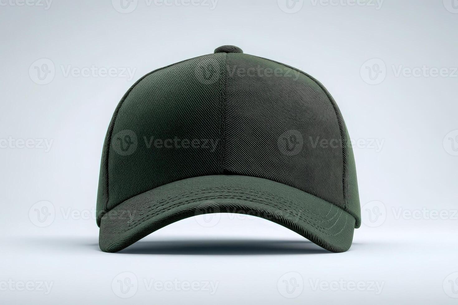 A green cap is centered on a light gray background, showcasing its clean lines and structured design. The cap has a curved brim and no logos, highlighting its simple yet fashionable appeal. photo