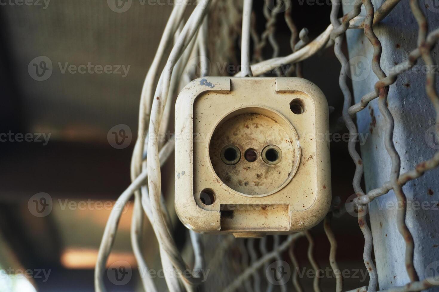an old electrical outlet, an extension cord, which imagined itself to be the highest element of art, surpassing the imagination of the critic. photo