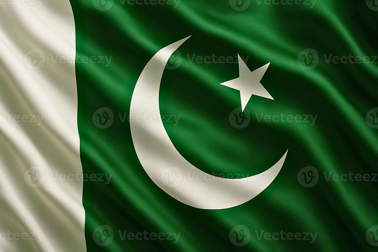 Pakistan national flag waving with smooth fabric texture in close-up view on a green background photo