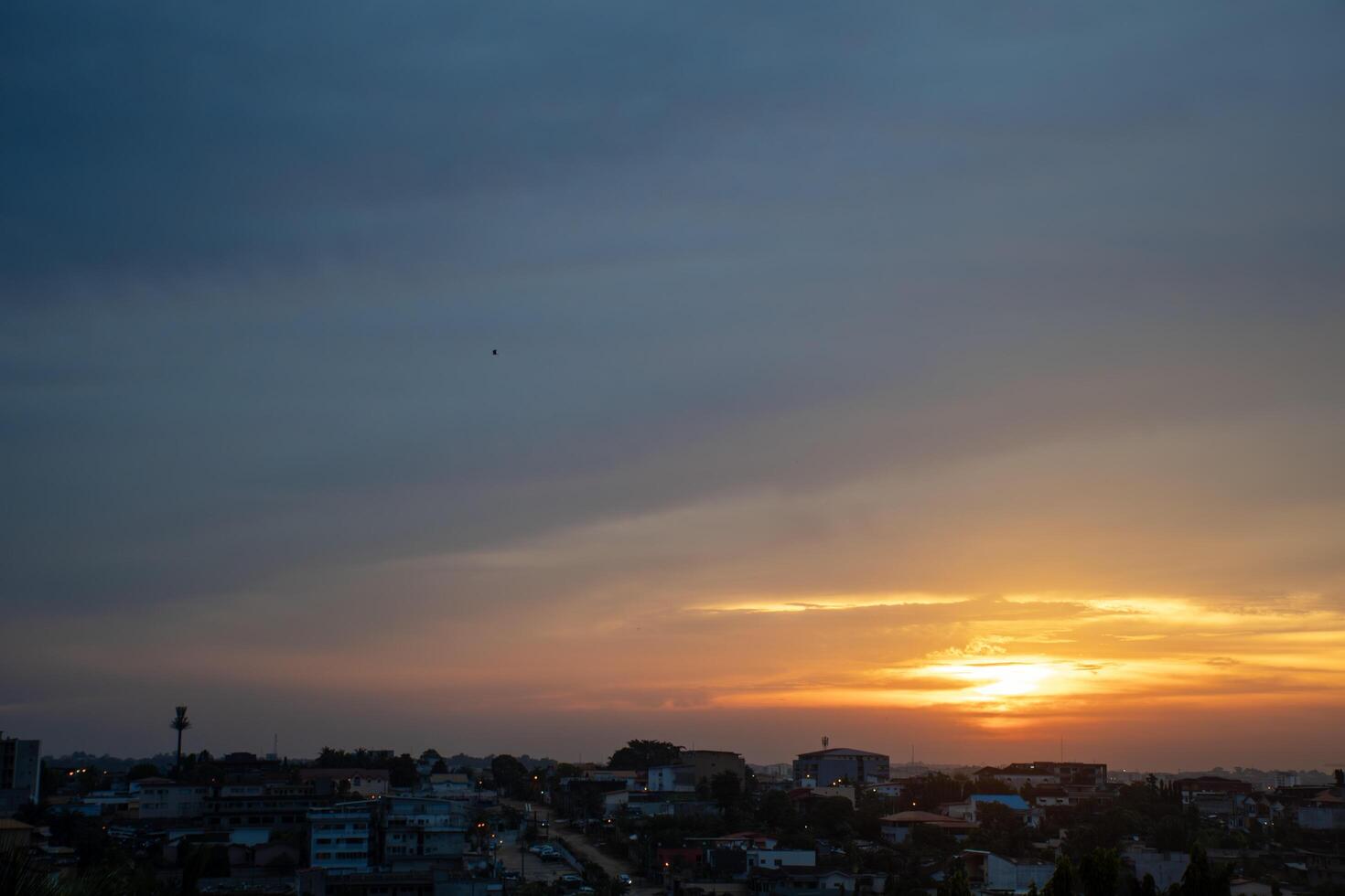 Blazing twilight over Abidjan, End of day lights photo