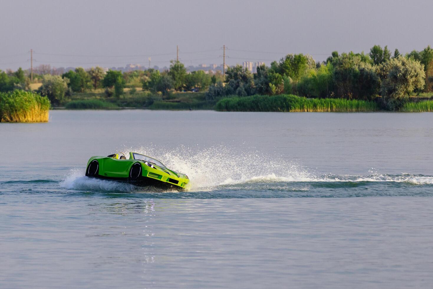 A young man glides across the water on a jet ski designed like a car, enjoying summer waves. Concept innovation, thrill photo
