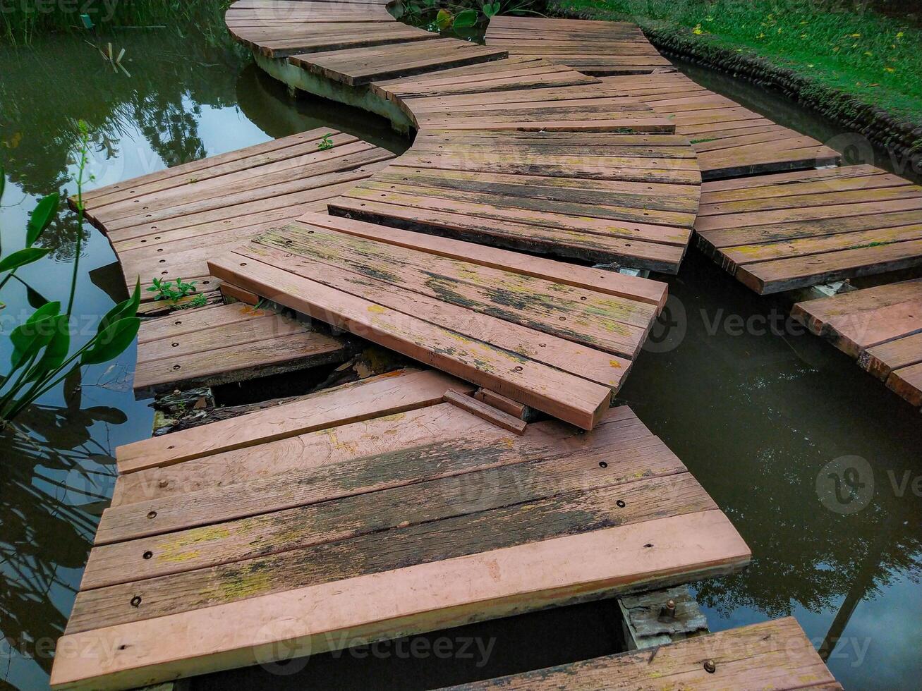 A wooden walkway that is made of wood photo