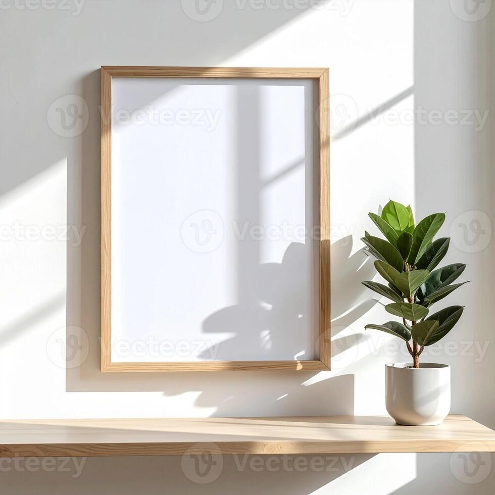 Minimalist Poster Frame Mockup Hanging on White Wall with Natural Diagonal Light Shadows photo