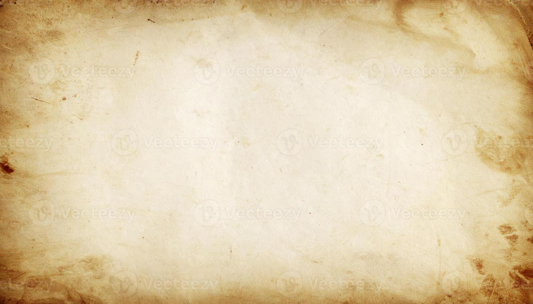 Vintage aged paper with a textured, grunge-style background photo