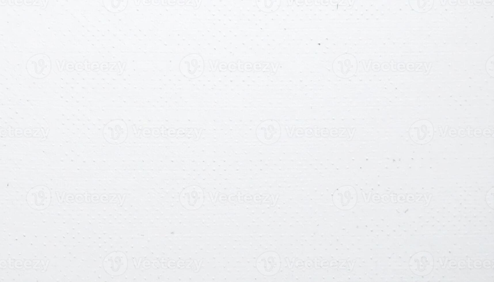 Close-up of a textured paper background with white dotted design photo