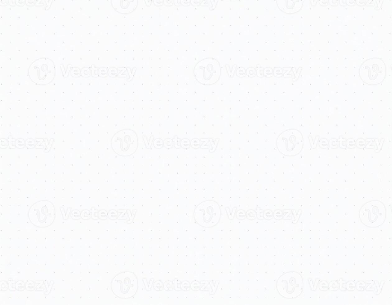 Close-up of white paper with tiny dotted pattern and textured surface photo