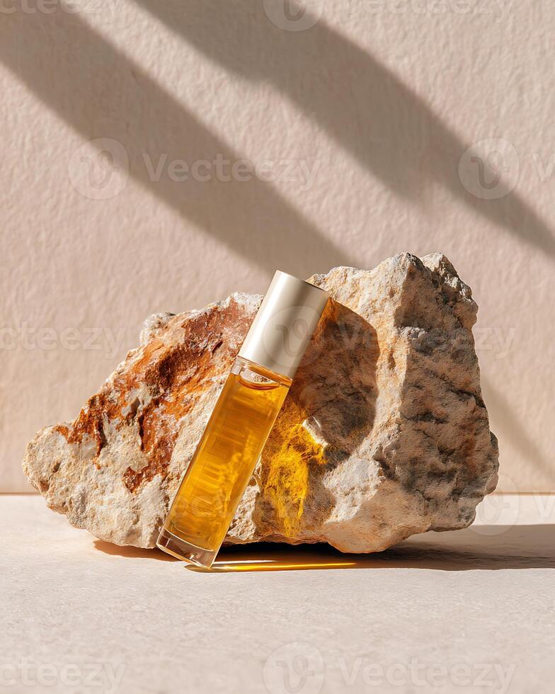 Fragrance oil on stone surface photo