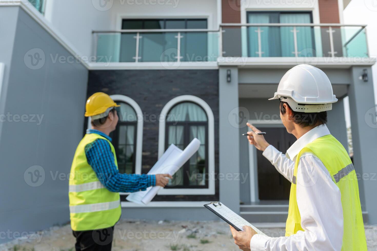 inspector engineer and owner project is inspecting construction and quality assurance new house. Engineers or architects or contactor work to build the house before handing it over to the homeowner., photo