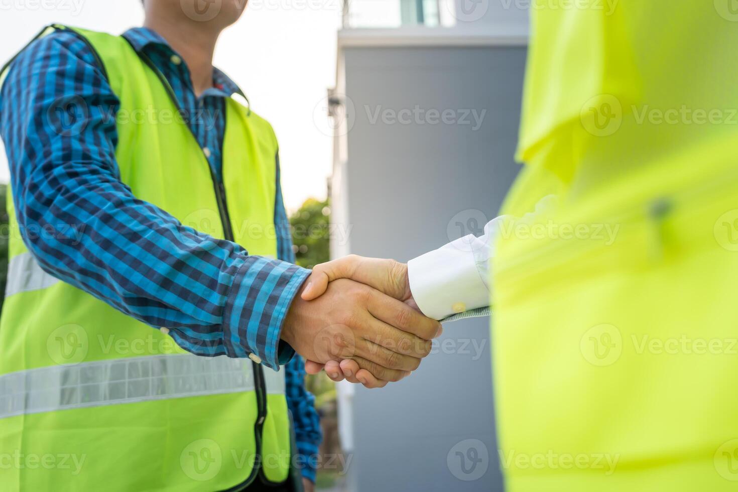Construction team. hands shaking greeting start up plan new project contract in office center at construction site, industry ,architecture, partner, teamwork, agreement, property, contacts. photo