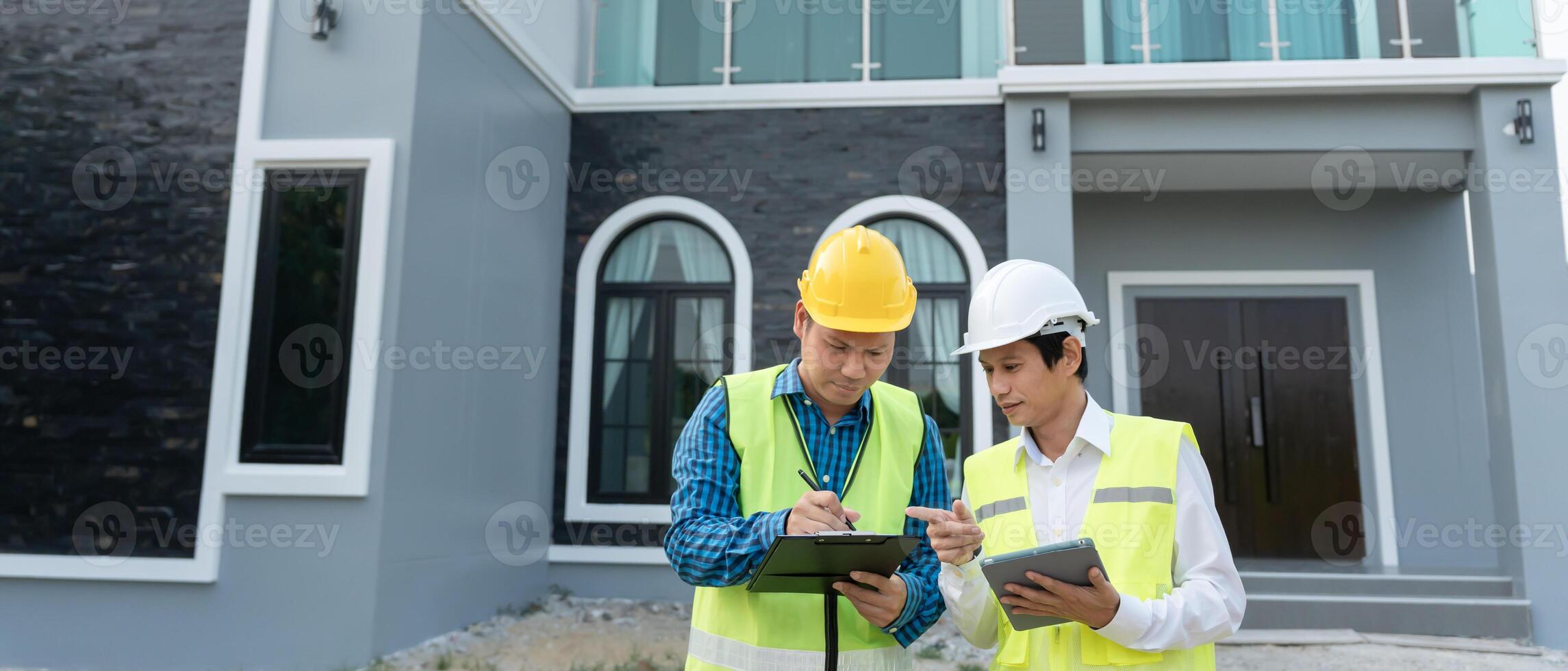inspector engineer and owner project is inspecting construction and quality assurance new house. Engineers or architects or contactor work to build the house before it over to the homeowner. photo