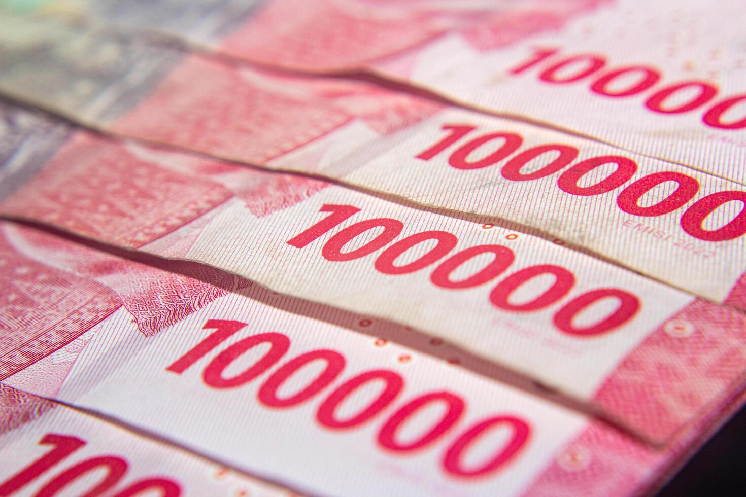 Close up Indonesian Rupiah Denomination One Hundred Thousand Currency Finance photo